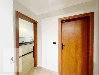 Furnished apartment for rent near the American University in the Fifth Settlement, 3 bedrooms, super lux finishing, fully furnished, all electrical appliances, air conditioners, and a large balcony