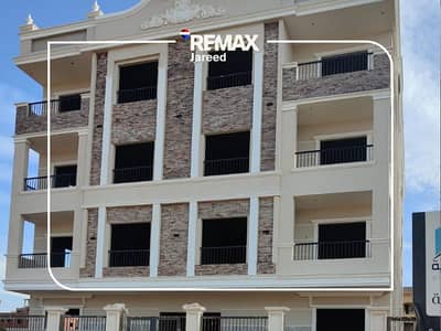 Duplex for Sale in Bait Al Watan Ashasi, Sheikh Zayed | Ground with Garden | Corner on a Corridor