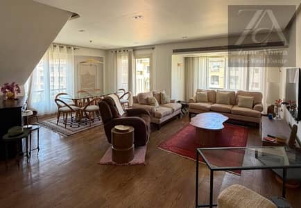 Furnished 4-bedroom penthouse for rent in Stone Residence Compound, Katameya, Cairo, with kitchen and air conditioning.