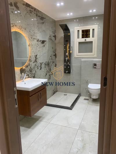Ground floor apartment with a garden for sale in Al-Khamail Compound