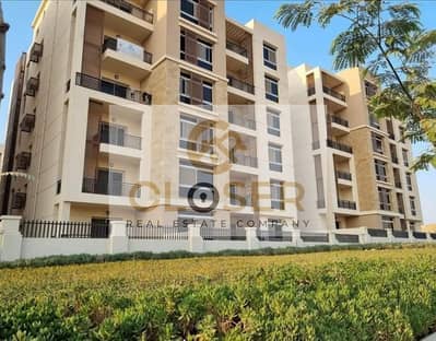 Two-bedroom apartment for sale with a 500,000 down payment in Taj City, New Cairo (delivery in a few months).