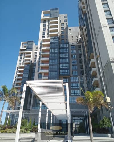 Apartment for sale, ready for immediate delivery, finished with air conditioning and kitchen in Ion Towers behind Mall of Arabia.