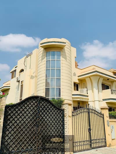 Receive and move in immediately to a luxurious villa with a private swimming pool for sale in the heart of the Fifth Settlement next to Waterway