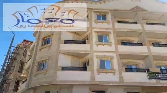عمارة للبيع تشطيب سوبر لوكس ناصيه بحرى على ميدان وشارع رئيسى جنوب طريق السويس