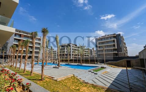 للبيع شقة 128 متر في كمبوند باتيو اورو التجمع الخامس نيو كايرزو الجولدن سكويرPatio Oro Compound New Cairo Fifth Settlement Golden Square