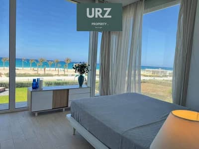 في شالية صف اول lagoon & seaview بموقع بانورامي fully finished + ACs مميز وبخصم 35 % من سعر للبيع في الساحل الشمالي بالقرب مراسي و مدن و ذا مد و سيزن