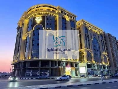 Office for rent with air conditioning Grand Plaza Administrative Tower Zahraa Al-Maadi Al-Ma'raj Street Carrefour 85 meters - Floor 9