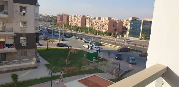 Apartment for rent in the Dar Misr compound, District 12, Sheikh Zayed. Features a north-facing view, an elevator, a prime location, and a wonderful v