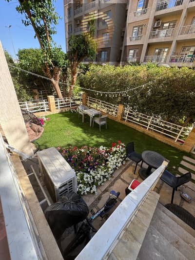 82 sqm ground floor apartment with 45 sqm garden for sale in Madinaty, super deluxe finish - garden view
