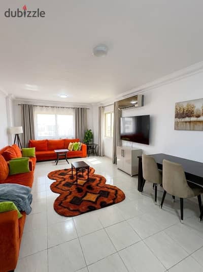 Furnished apartment for rent in Madinaty B10, area 140 m, very prime location directly in front of First Season Park. High-quality finishing and luxurious furnishings, close to services and restaurants.