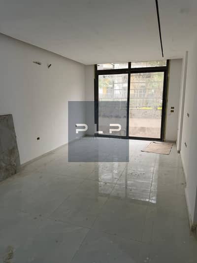 Super Lux Furnished Apartment with Private Garden for Sale in The Icon New Cairo