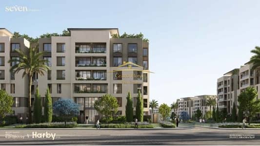 Apartment for sale at a bargain price inside a compound in the heart of the Al-Hadaeq area on a main road, consisting of two bedrooms, two bathrooms,