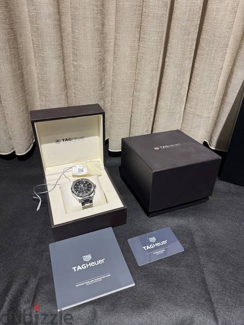 Tag Heuer Aquaracer with Master Dynamic Headset 1
