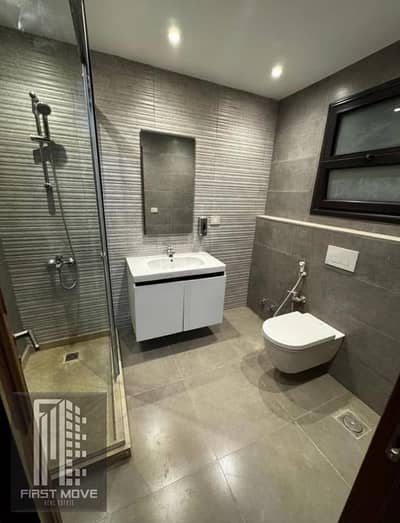 Fully finished 3-bedroom apartment with air conditioning units and a kitchen, in a prime location in Shorouk City.