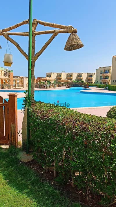 Two-bedroom chalet on the swimming pool