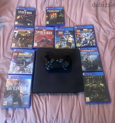 PlayStation 4 with controller and games