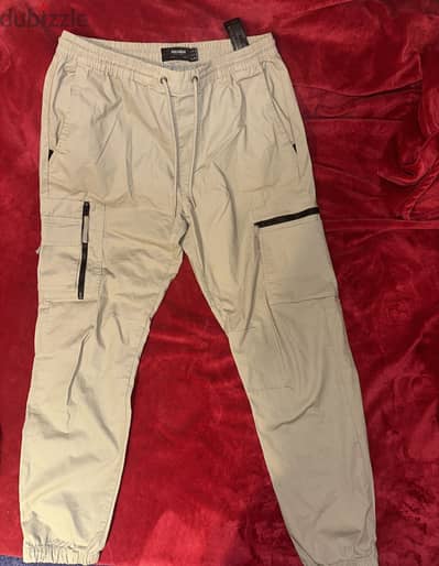 original pull and bear beige cargo pants/ Jo. اند بير بنطلون بيج كارجو