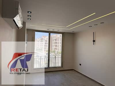 Apartment for rent with kitchen and air conditioning, ultra-super-lux finishing, in Taj City Compound - First Settlement  Prime location, open view