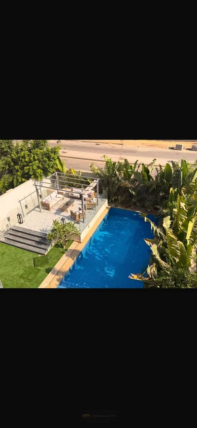 Twin House + Overflow Swimming Pool + Jacuzzi on the Roof + Panoramic View of Sheikh Zayed — one of the largest Twin House units in Karma 4.