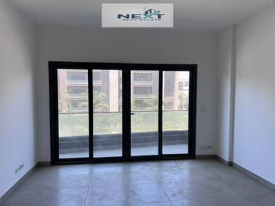 For rent in Madinaty, a new law apartment, 131 sq m, with a private garage, 3 bedrooms + 2 bathrooms, excellent condition, garden view, very close to