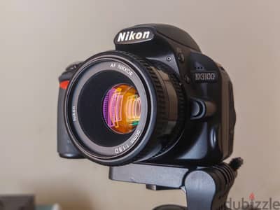 كاميرا  Nikon D3100 + لينس 50 مللي