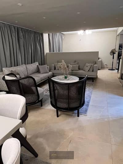 An exceptional 200m² apartment for sale in the 9th District of Sheikh Zayed, featuring a 200m² garden and overlooking the Dahshur Link Road.