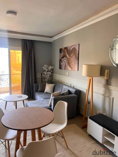 Beta Gardens October Gardens Apartment very prime location fully furnished with ACs for rent  Second floor 2 bedrooms 1 bathrooms ultra super lux