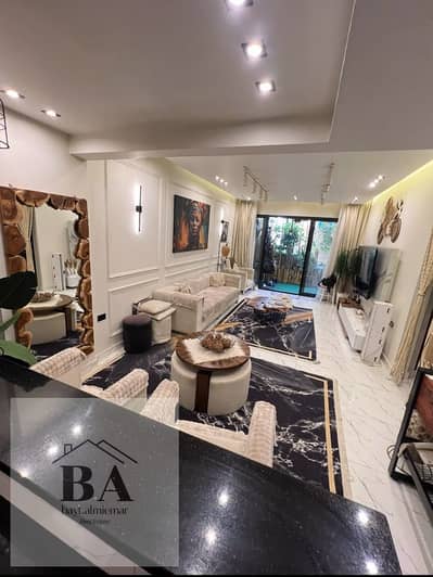 A distinctive apartment for living and investment in the Al-Khamail Compound, villa area. Ground floor apartment with a private garden, two rooms, and one bathroom, and a private garden of 100 square meters. The apartment will be sold furnished at a very special price with ultra-super luxe finishing and new furnishings. Close to services and the gate. The apartment is in an excellent location.