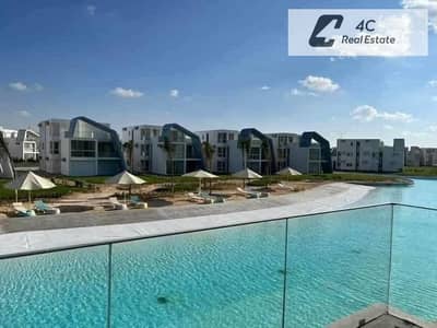 لسرعه البيع شاليه لوفت كورنر تشطيب كامل Direct Crystal Lagoon View ريسيل فوكا باي الساحل الشمالي بتقسيمه مميزة جاهز للمعاينه