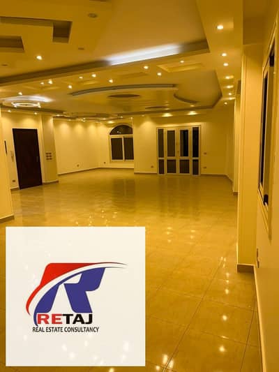 Apartment for rent in a prime location in Yasmin Villas 2, overlooking a garden, one minute from Sadat Axis and three minutes from Mustafa Kamel Axis,
