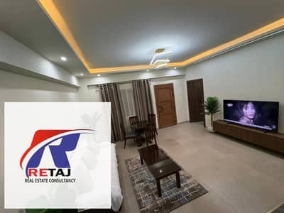 Furnished hotel apartment with ultra-super-luxurious finishing for rent in Al Banafseg Villas, First Settlement  close to services, open view