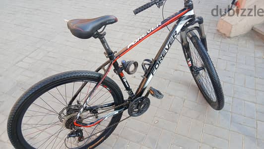 forever bicycle in red and white and black