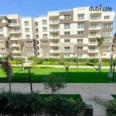 107-square-meter apartment for sale in B12, with payment plans extending up to 12 years.