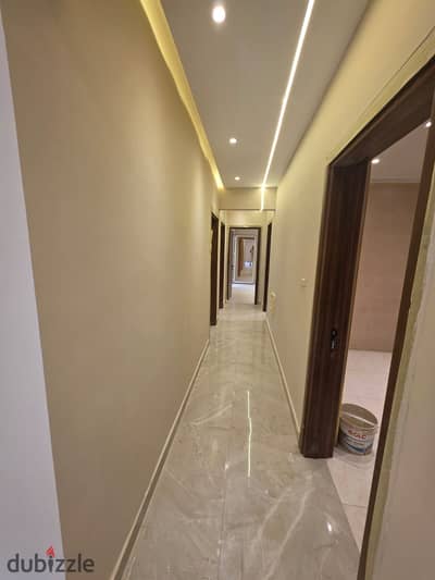 Apartment for sale in Nasr City, District 7, between Abbas El Akkad and Al-Tayaran and near the main Mustafa El Nahhas Street