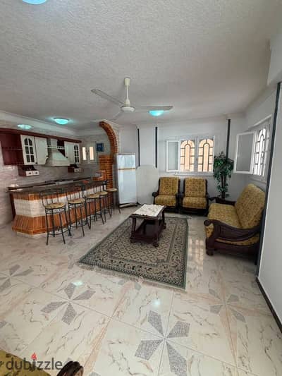 Apartment furnished appliances for sale in Al-Ajami, Al-Nakhil beach, next to the main street, excellent residential location with services included, luxurious finishing