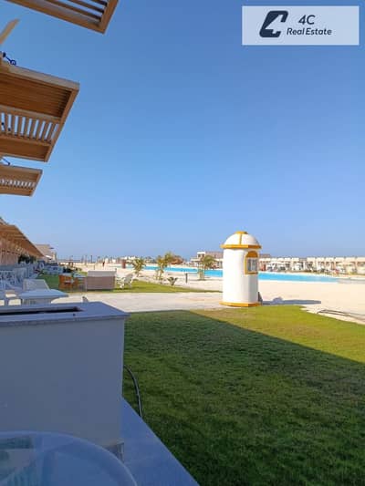 Chalet for sale 170 m with garden 3 Bdr ready to move prime location double lagoon view in Playa Sidi Abdel Rahman North Coast