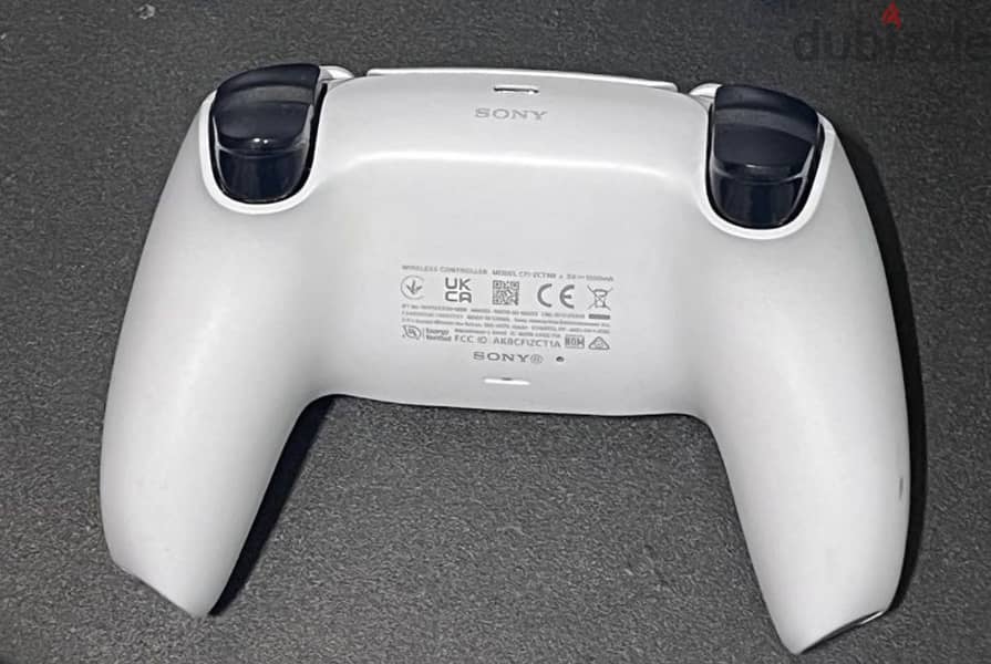 PlayStation 5 with purple covers and 1 controller. 6