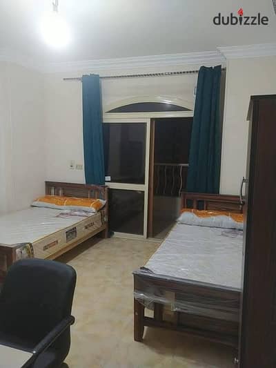A room from inside an apartment for rent furnished for upscale living for students and employees directly on the ring road in front of Bavaria and next to the Tabarak compound opposite the College of Medicine near all services and transportation and Carrefour on the ring road