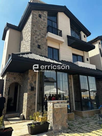 Townhouse 185m² finished with air conditioning for sale in MarQ Gardens, New Cairo