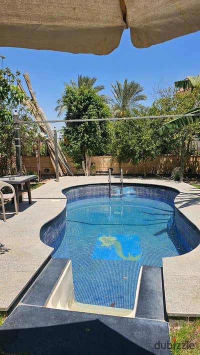 Luxury Standalone Villa مفروشة بالكامل على 550م مع Private Pool وGarden للايجار في Zizinia New Cairo - Prime Location و3 Bedrooms
