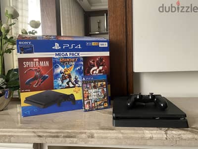 Ps4 slim + gta 5 بالعلبه