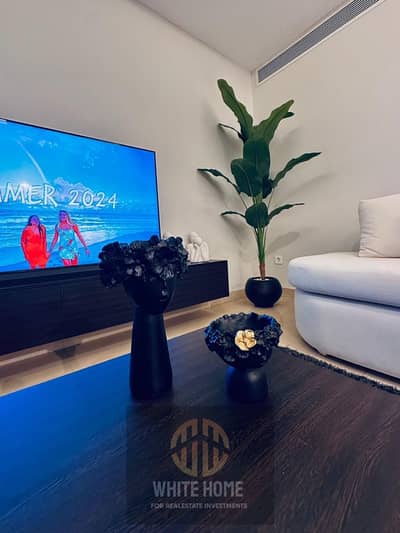 Apartment ultra modern finishing in Cairo festival city New cairo festival Living fully furnished Brand New, nearest to the mall & pool & gym & Aura .