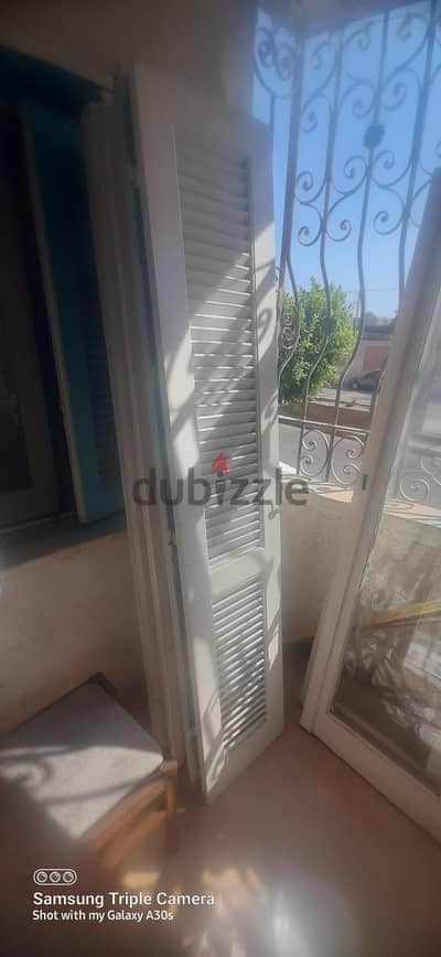 لوط خشب شيش وزجاج بلكونات