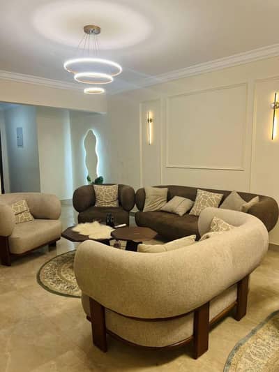 Apartment for rent in the Janna Zayed 2 compound, Sheikh Zayed. Features include air conditioning, internet, and modern furnishings, prime location
