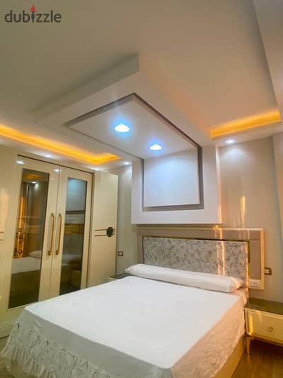 شقة Luxury مفروشة بالكامل للايجار في Azad New Cairo | غرفتين وDirect Pool View مع خيارات Short & Long Term