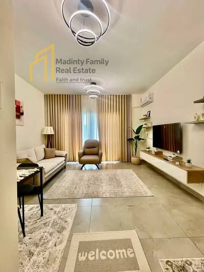 For rent fully furnished first residence in the upscale phases of Madinaty, Brivado, high-quality finishing, repeated floor, wide garden view, available for inspection
