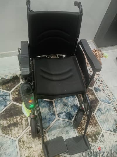 كرسى متحرك بالكهرباء