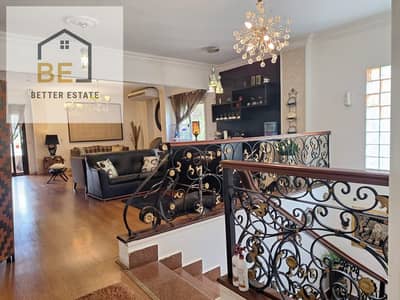 Duplex for sale in New Cairo, behind Mirage, Renaissance Hotel, and Marriott Hotel. Villa-only area. Elevated ground floor.