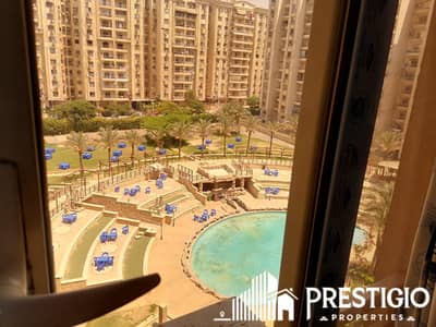 Apartment for sale, 205sqm, in Maadi Grand City compound, with a direct view of the club, super lux finishing, with 2 parking spaces.