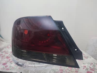 فانوس اصلى خلفى شمال به كسر